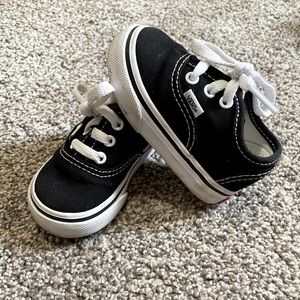 Black toddler Authentic style Vans.